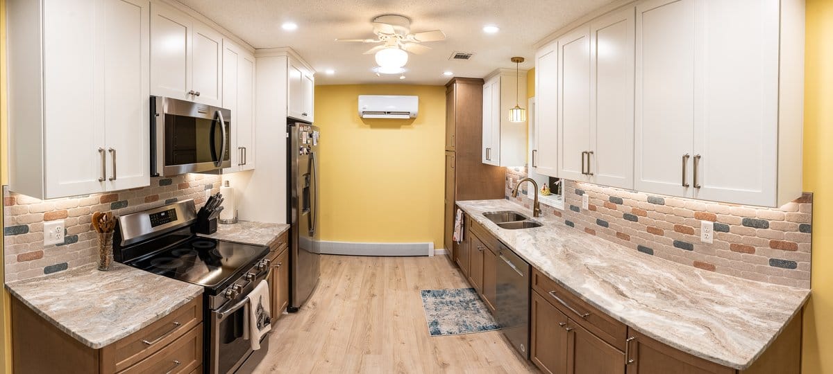 White shaker cabinets with quartz countertops